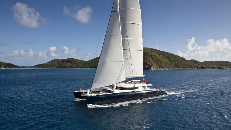 World's largest sailing catamaran returns to Pendennis for refit work