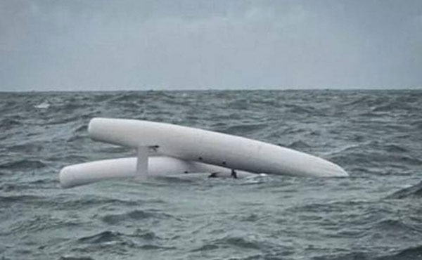 Sailor rescued clinging to upturned yacht off the Isle of Wight